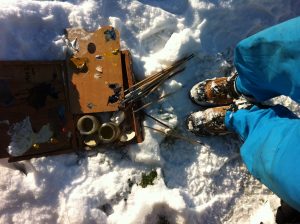 photo showing plain air painting equipment in the snow