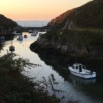 Sunrise and boats at Porthclais Harbour